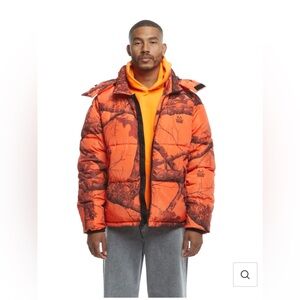 The Very Warm Realtree EDGE® Hooded Puffer - Orange Camo